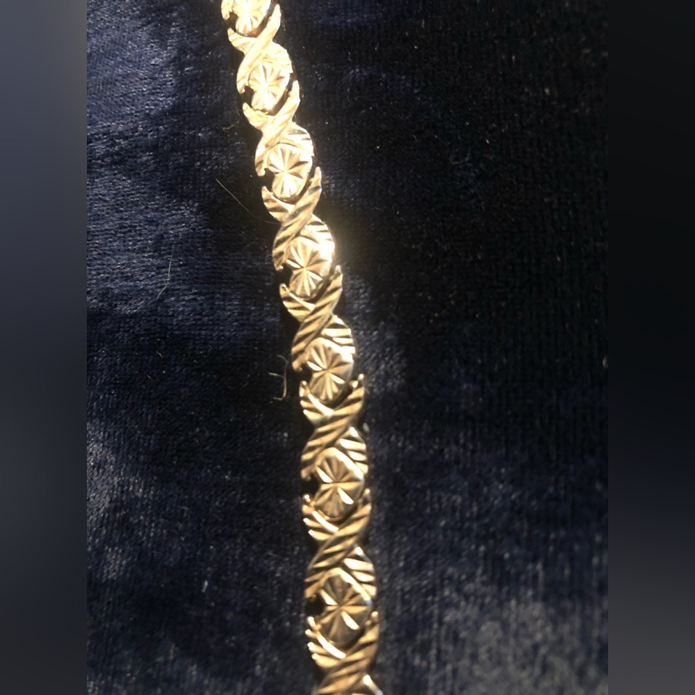 Real gold, plated, hugs and kisses bracelet